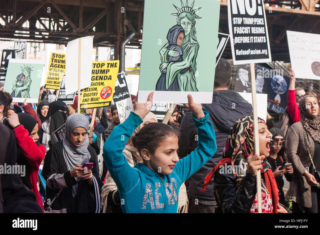 Chicago, Illinois - Feb. 19, 2017: Chicago marks the one-month anniversary of the Donald Trump administration with a protest rally and march. Stock Photo