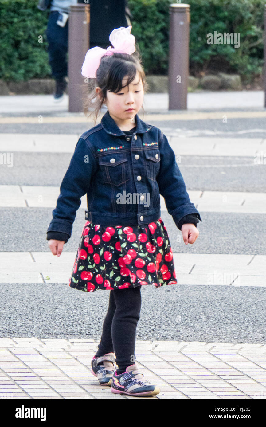 A young girl, Tokyo Rockabilly Club member, dancing in Yoyogi Park, Shibuya, Tokyo, on a Sunday afternoon. Stock Photo