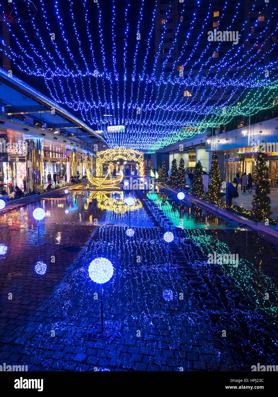 Mock Venetian lighting display is a shopping arcade in Tokyo Dome City. Stock Photo