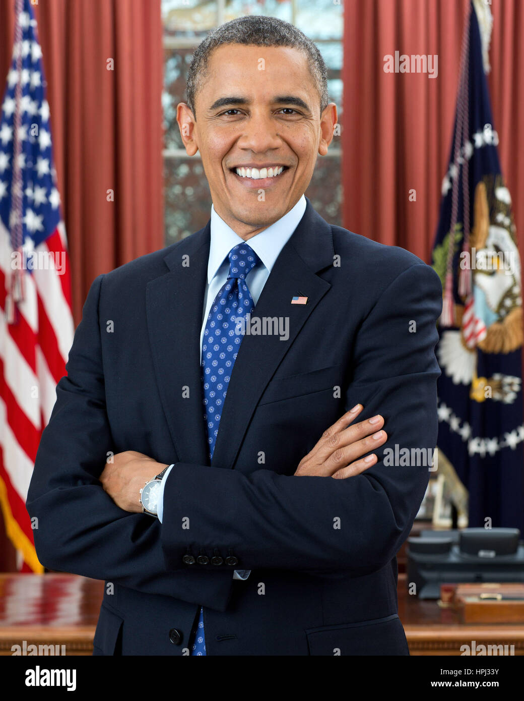 PRESIDENT BARACK OBAMA poses for an official photo in the Oval Office, 6 December 2012.  Photo: Pete Souza/White House official Stock Photo