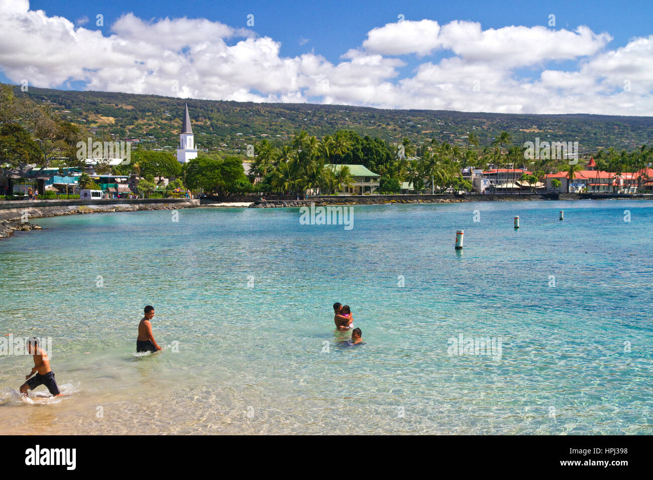 People swimming in the bay at Kailua-Kona on the Big Island of Hawaii, Hawaii, USA. Stock Photo