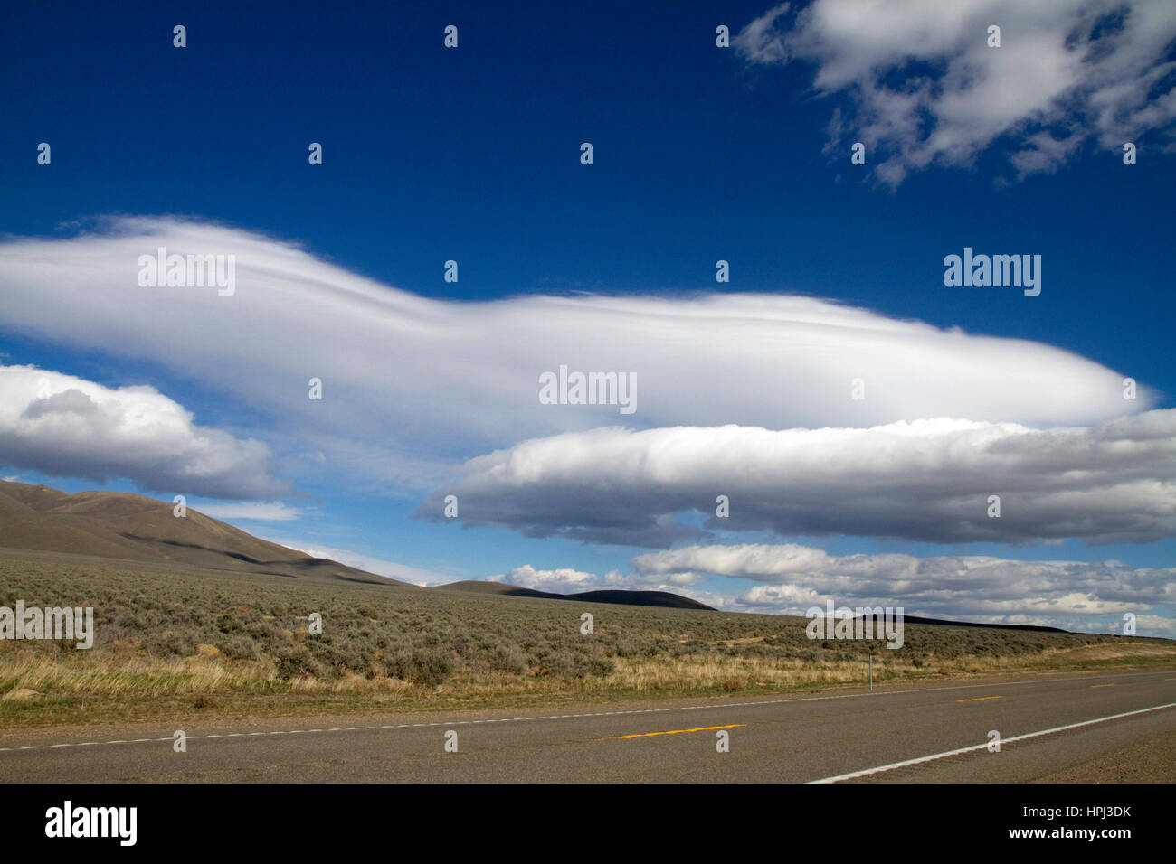 Clouds in the sky above the high desert of Nevada west of Winnemucca along Interstate 80, USA. Stock Photo