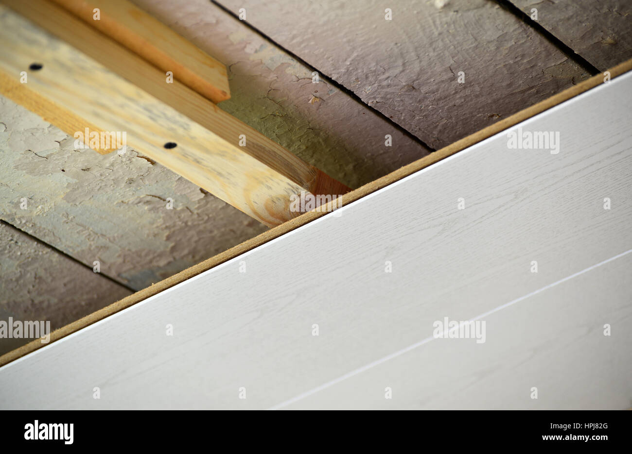 Installation of the ceiling of MDF panels Stock Photo Alamy