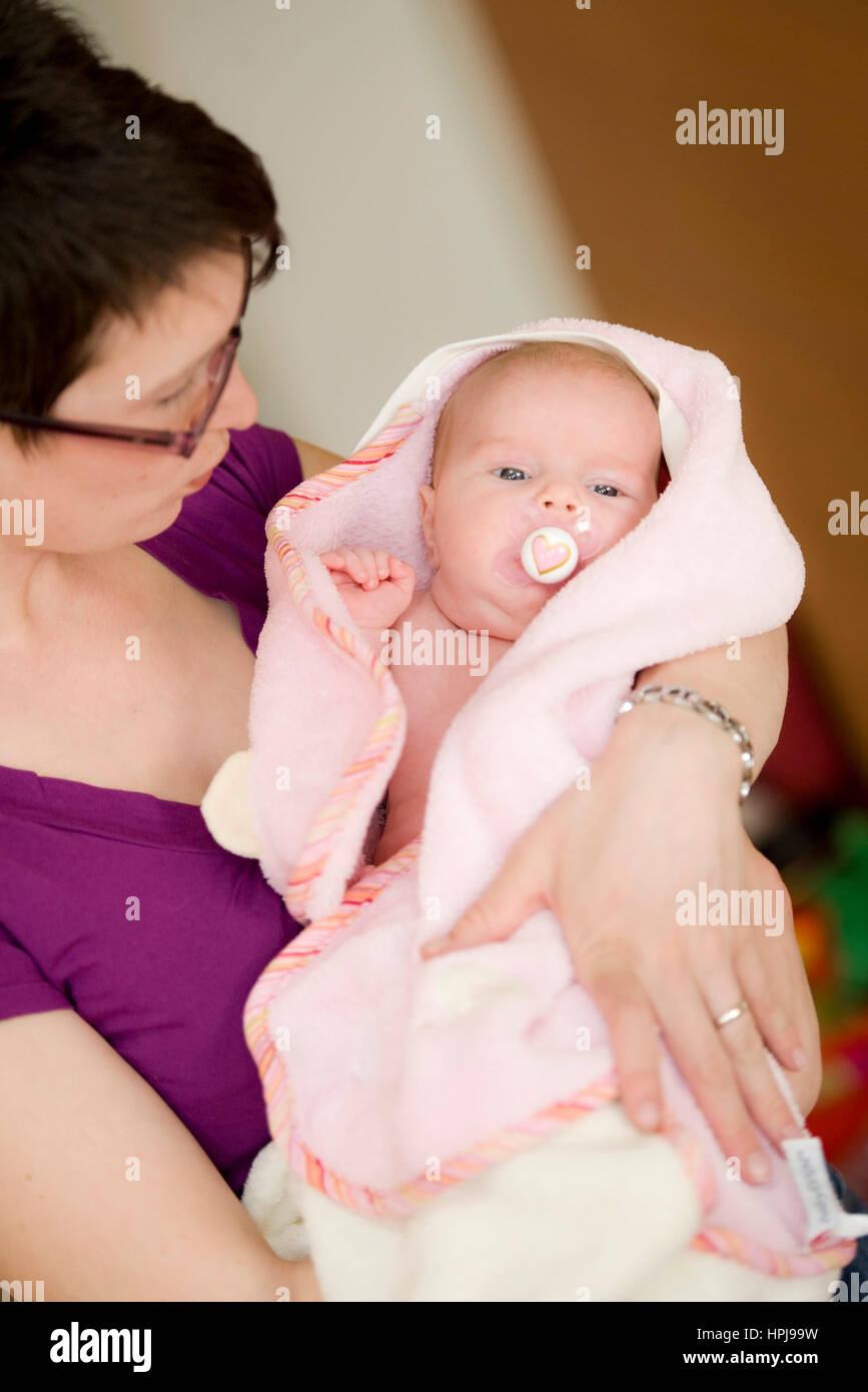 Model released , Mutter mit Baby im Arm - mother with baby Stock Photo