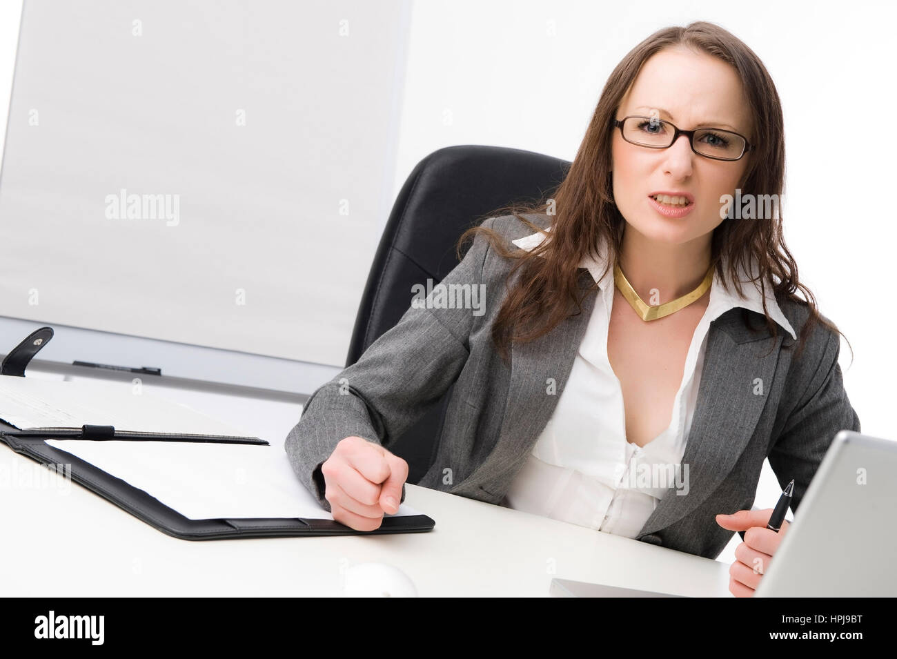 Model released , Geschaeftsfrau im Buero aergert sich - angry business woman at office Stock Photo