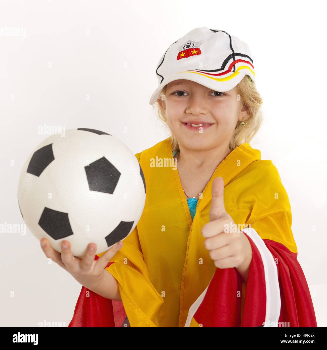 Model released , Maedchen als Deutschlandfan, Fussballfan soccer fan