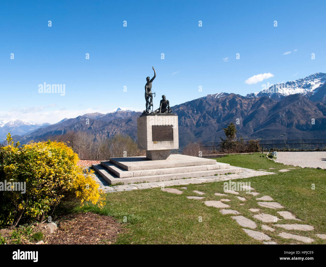 Ghisallo, Italy - April 1, 2015: Monument in memory of cyclists to he Madonna del Ghisallo, proclaimed Patroness of Cyclists by Pope Pius XII in 1946 Stock Photo