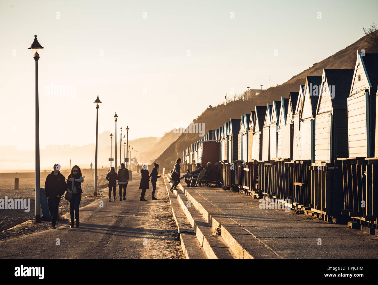 A Walk Along Bournemouth Beach At Sunset In Winter Stock Photo Alamy