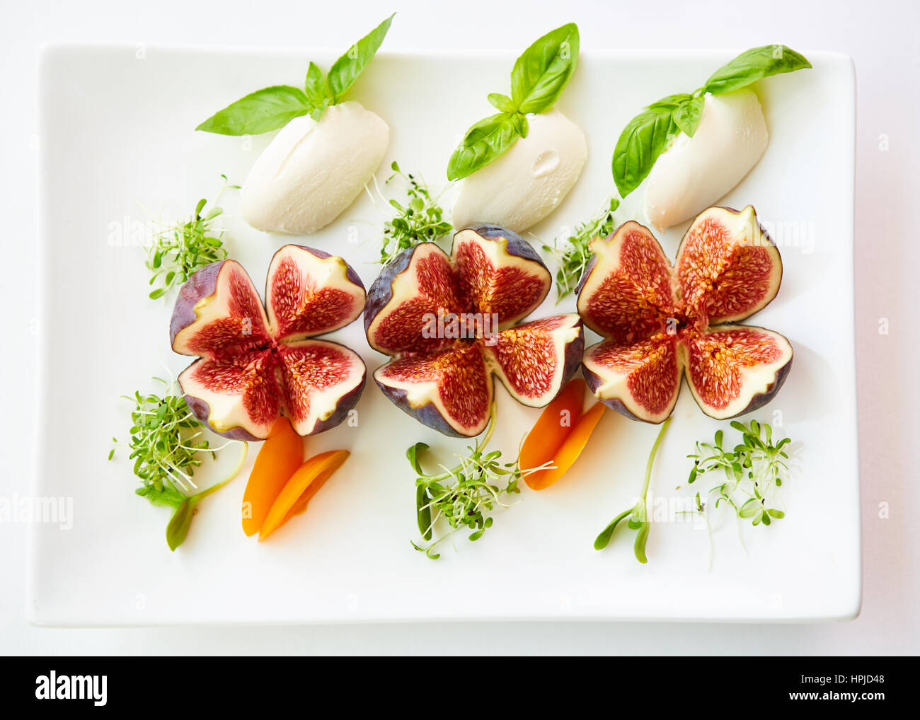 Filled figs with feta cheese. Top view Stock Photo Alamy