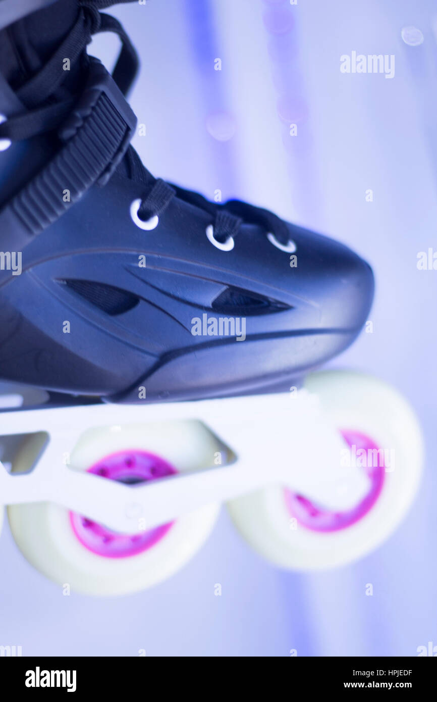 Freestyle inline skates boots and wheels in retail store shop window