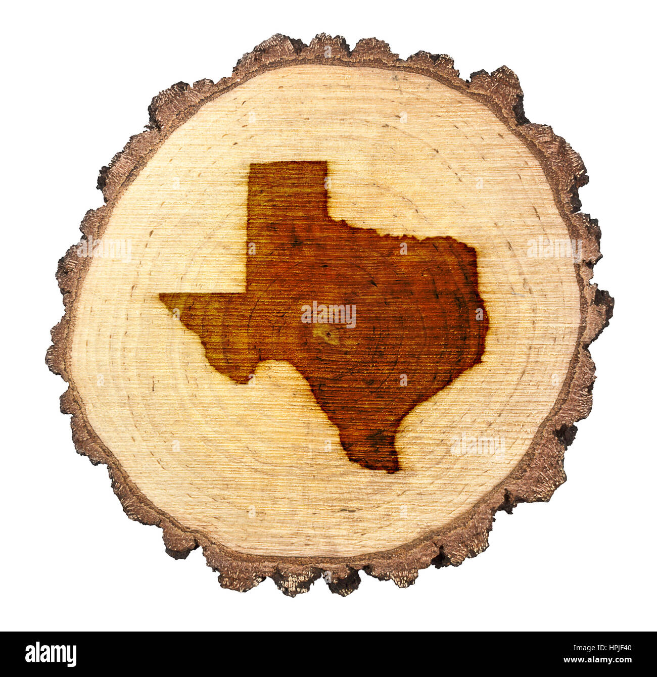 A slice of oak and the shape of Texas branded onto .(series) Stock Photo
