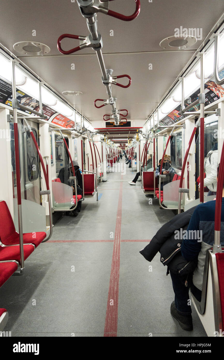 Looking down the subway cars in the TTC subway in Toronto Ontario