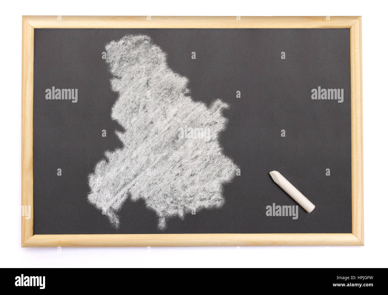 Blackboard with a chalk and the shape of Serbia Montenegro drawn onto. (series) Stock Photo