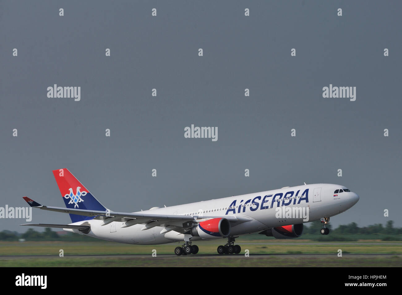 Air Serbia, national airline of Serbia Airbus A330 two-engine widebody passenger used for Belgrade to New York flights jet aircraft during take-off Stock Photo