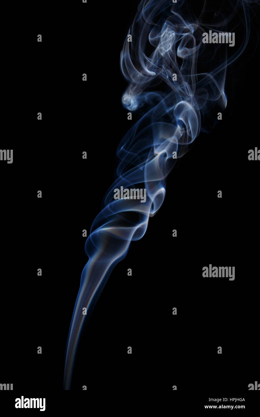 Abstract art. Color white blue smoke from the aromatic sticks on a