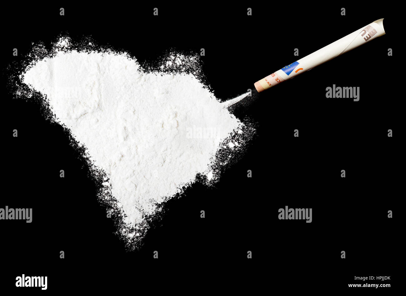 A powder drug like cocaine in the shape of South Carolina with a rolled money bill.(series) Stock Photo