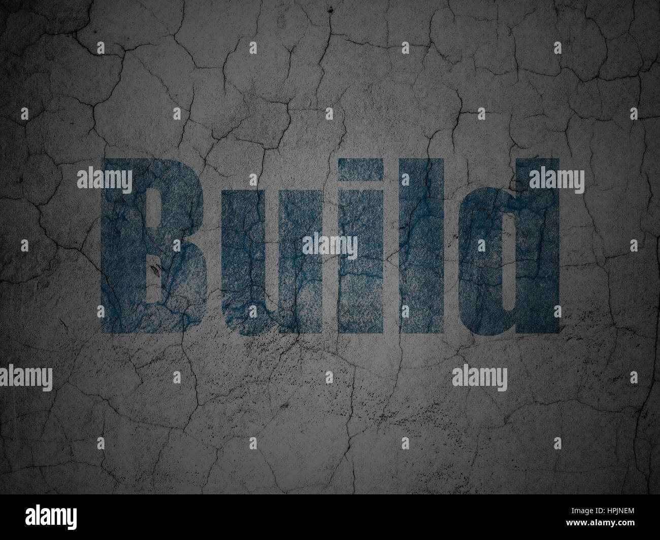 Constructing concept: Build on grunge wall background Stock Photo - Alamy