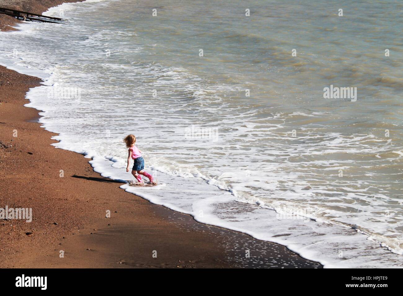 Isle Of Wight  - Little Girl By The Sea Stock Photo