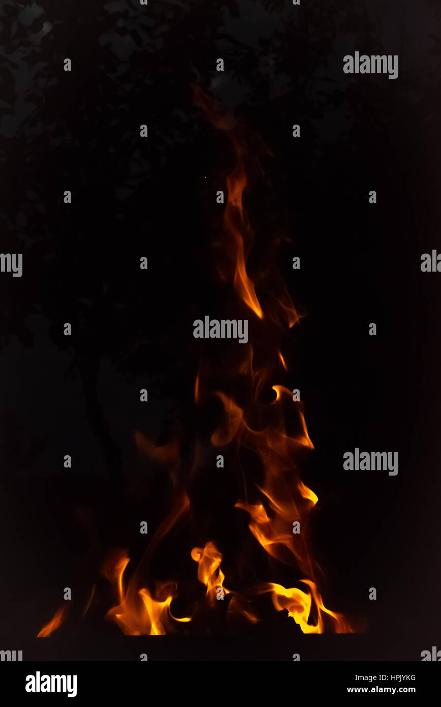 Fire flames bonfire at night on black background Stock Photo - Alamy