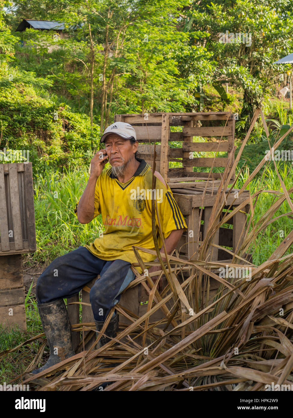 Jungle, Brazil - May 8, 2016:  Portrait of a man with a red skin in the Amazon  jungle Stock Photo