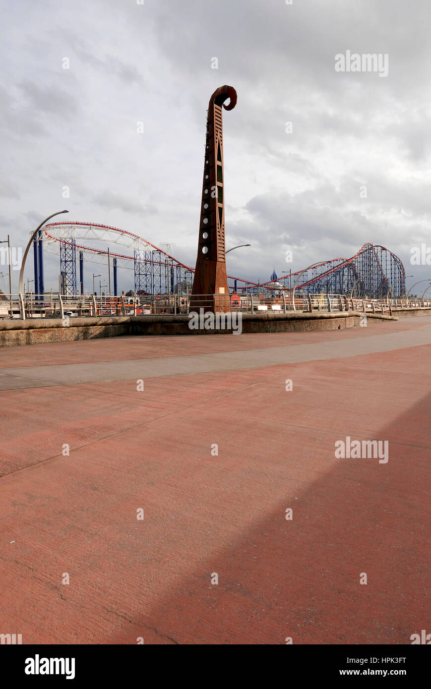 Sculpted wind chime and the Big One roller coaster at Blackpool