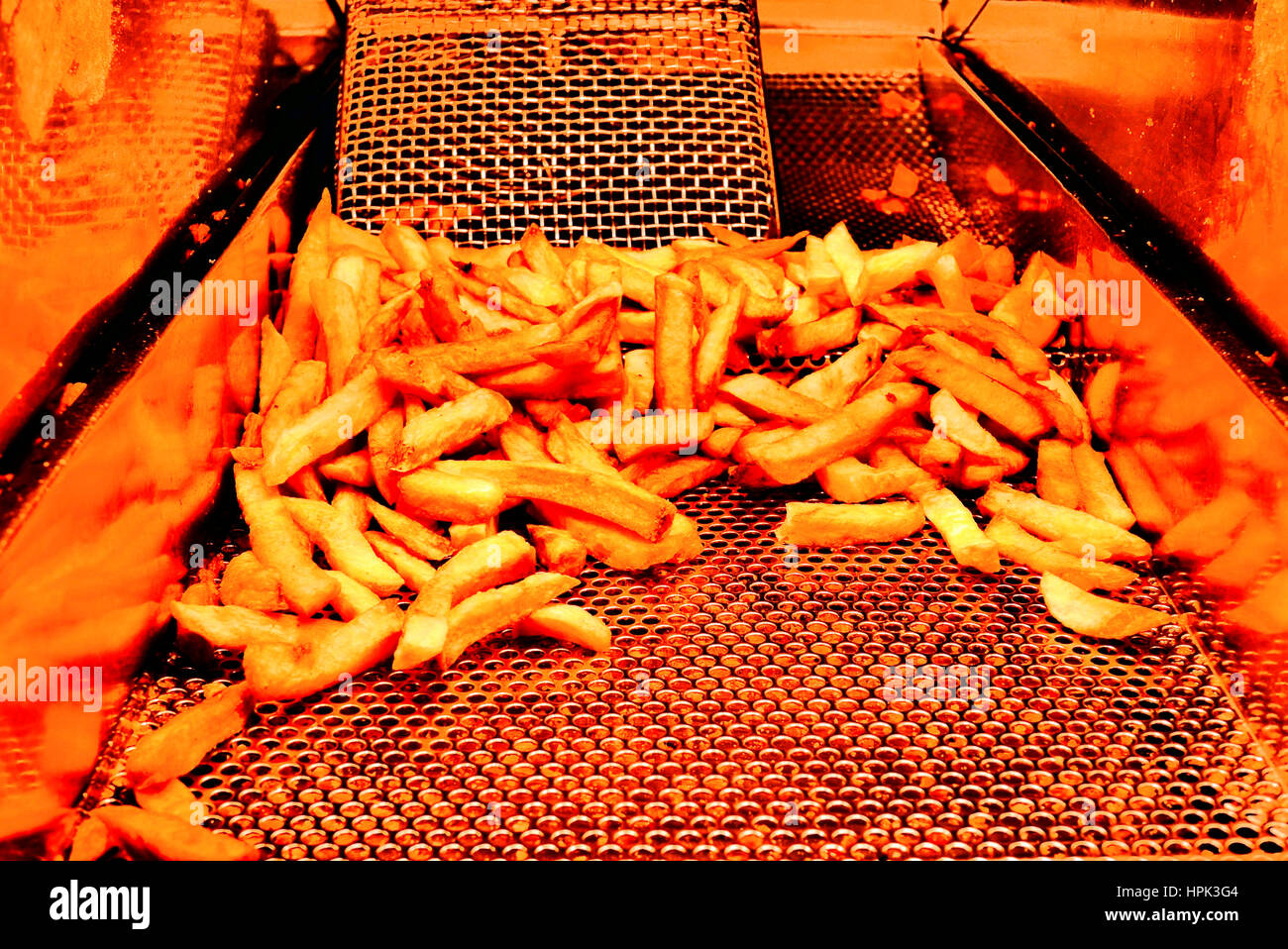 chips in food outlet fryer Stock Photo Alamy