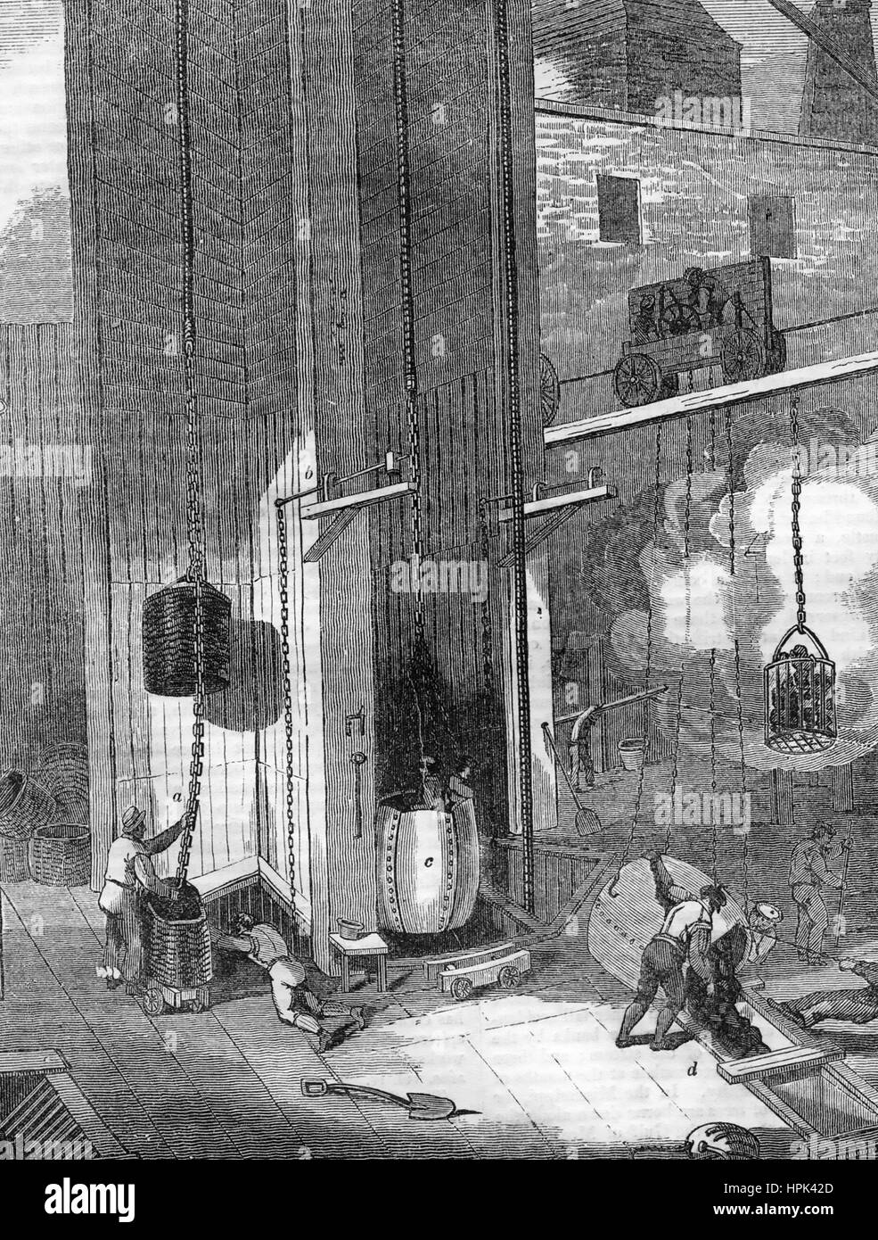 HULTON COLLIERY in the Lancashire coalfields, engraving about 1850 showing coal being hauled up from the mines owned by the reactionary William Hulton. Stock Photo