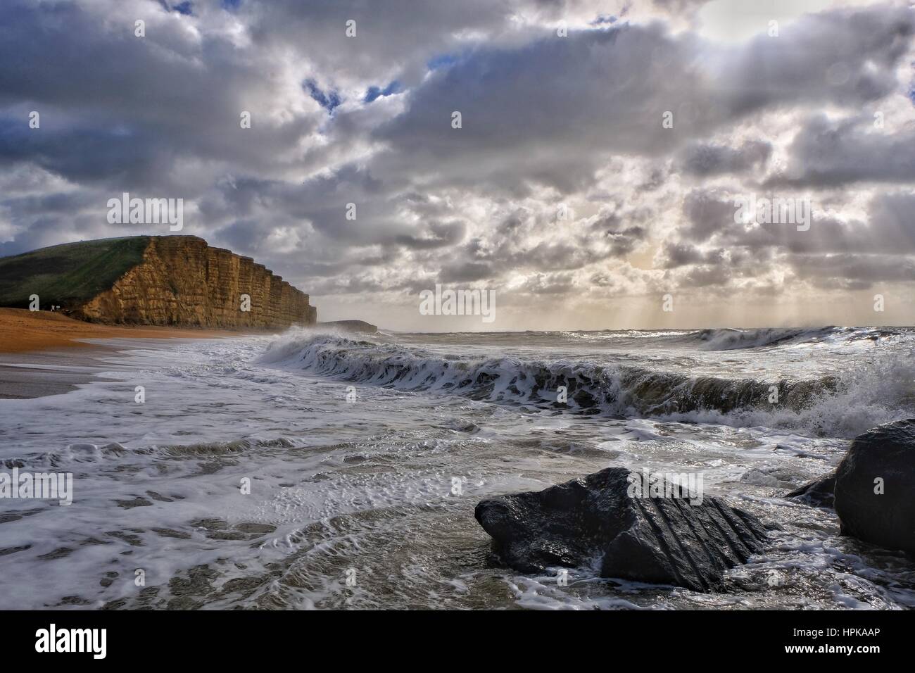 West Bay, Dorset, UK. 23rd Feb, 2017. Storm Doris blows in long the Dorset Coast. Winds of 50 to 60mph are expected during the day with coastal areas being particularly vulnerable. High tide in the area is expected at 16:15 when winds could still be particularly strong. Credit: Tom Corban/Alamy Live News Stock Photo