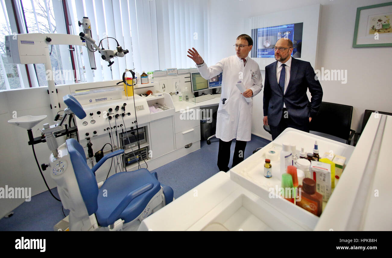 Clinic director Stefan Plontke (L) explains an examination room to SPD  chancellor candidate Martin Schulz at the ENT outpatient clinic at the  university hospital in Halle/Saale, Germany, 23 February 2017. He is