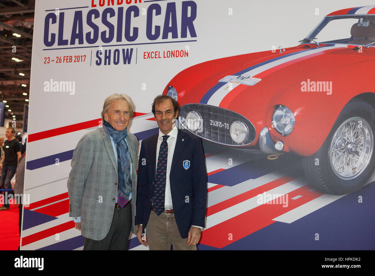 London, UK. 23rd Feb, 2017. Five times winners Derek Bell and Emanuele Pirro open the 2017 London Classic Car Show. 23rd February, 2017 Credit: Steve Parkins/Alamy Live News Stock Photo