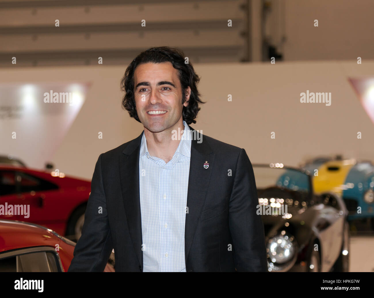 Three time Indy 500 winner, Dario Franchitti, opens the Ferrari Tribute Collection at the 2017,  London Classic Car Show. Stock Photo