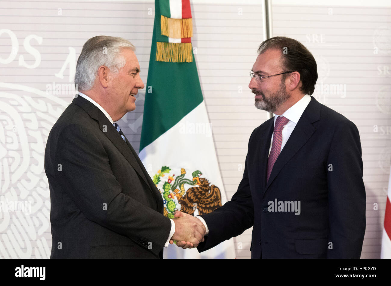 Mexico City, Mexico. 23rd Feb, 2017. Mexico's Foreign Affairs Minister Luis Videgaray(R) shakes hands with U.S. Secretary of State Rex Tillerson during a press conference in Mexico City, capital of Mexico, on Feb. 23, 2017. Top U.S. envoys on a working visit to Mexico on Thursday tried to allay fears that their government was preparing to massively deport undocumented migrants back across the border. Credit: Francisco Canedo/Xinhua/Alamy Live News Stock Photo