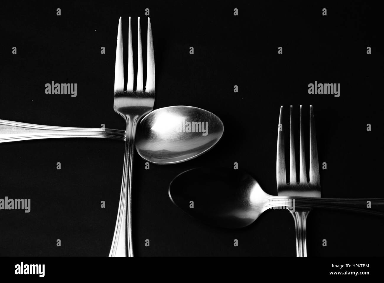 Fork and spoon background / spoons are the primary utensil used for