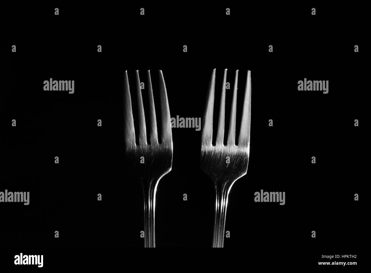 Fork and spoon background / spoons are the primary utensil used for