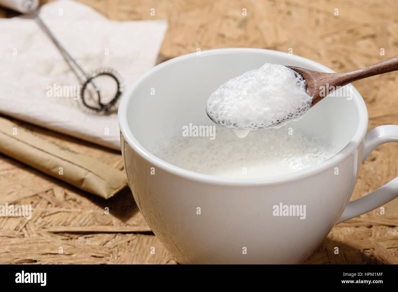 milk with bubbles, foamy milk, making bubbles milk Stock Photo Alamy