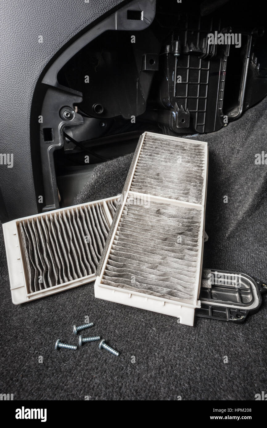 replacing cabin air conditioner filter of car Stock Photo Alamy