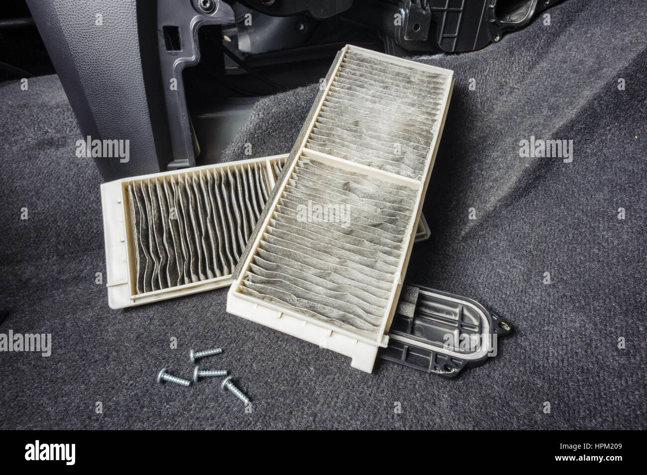 replacing cabin air conditioner filter of car Stock Photo Alamy