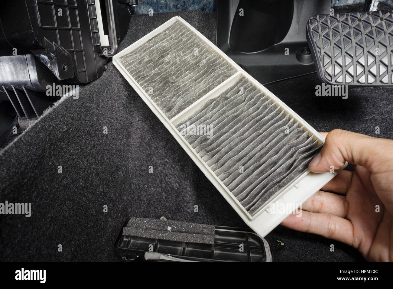 replacing cabin air conditioner filter of car Stock Photo Alamy