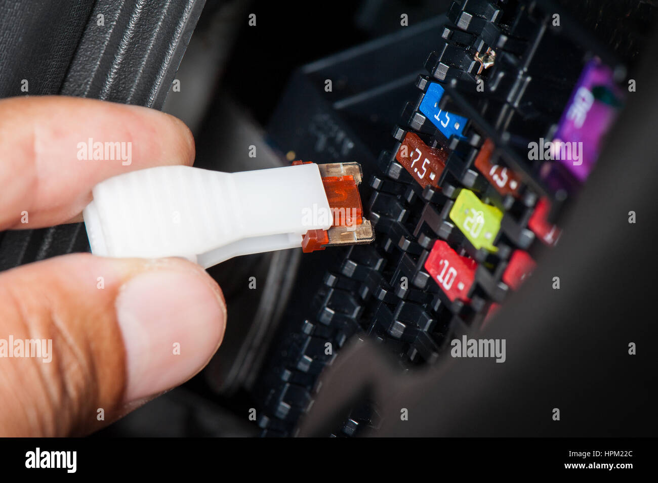 replacing the fuse in fuse box of the car Stock Photo Alamy