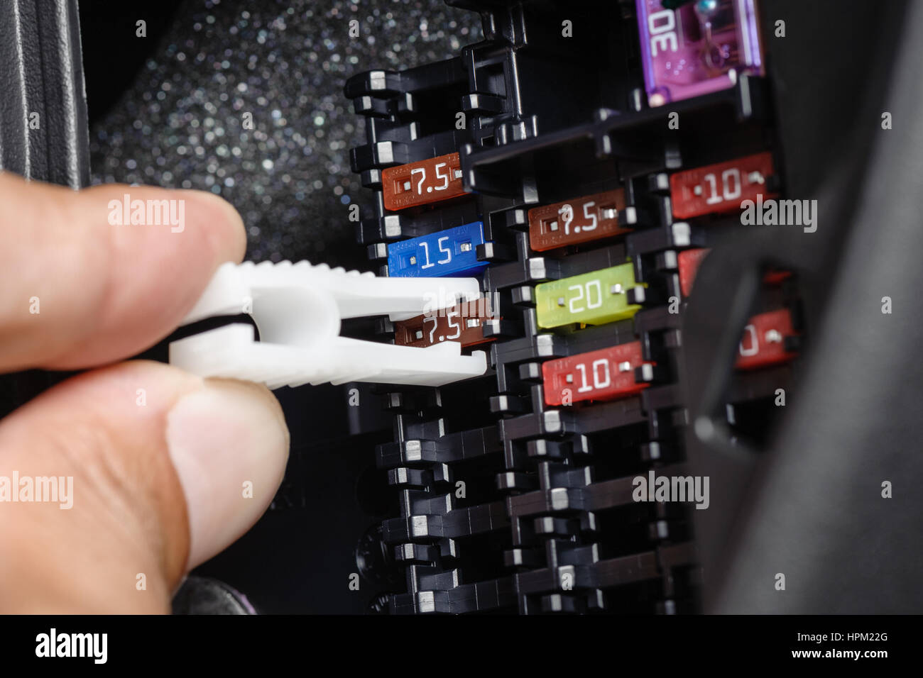 replacing the fuse in fuse box of the car Stock Photo Alamy