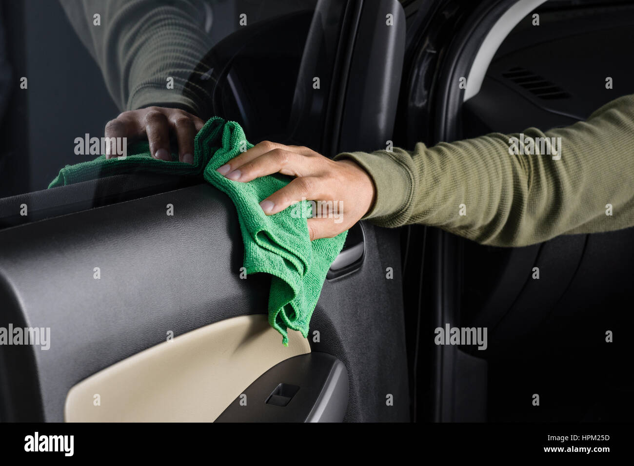 cleaning the car console with microfiber cloth Stock Photo - Alamy