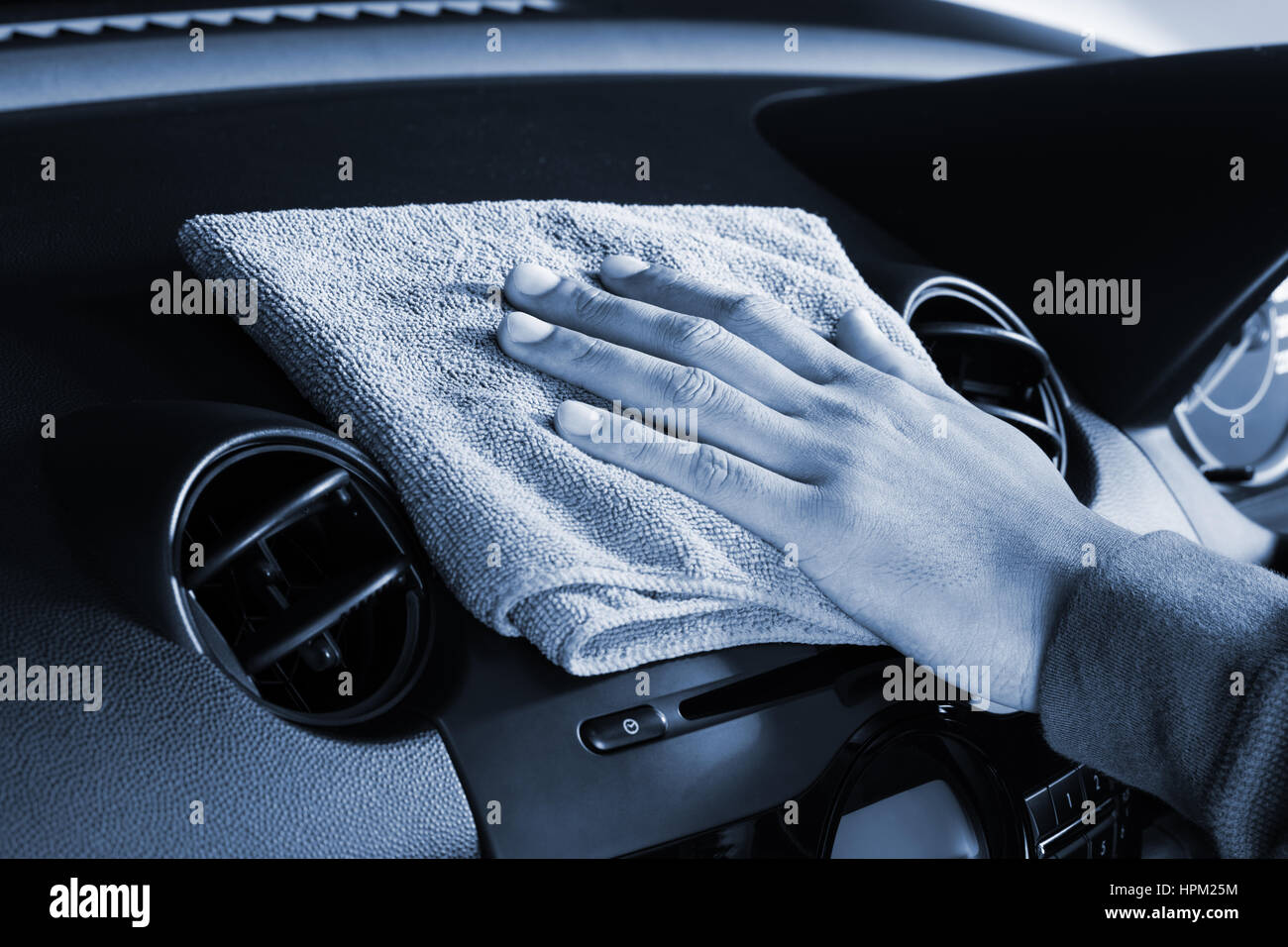 cleaning the car console with microfiber cloth Stock Photo - Alamy