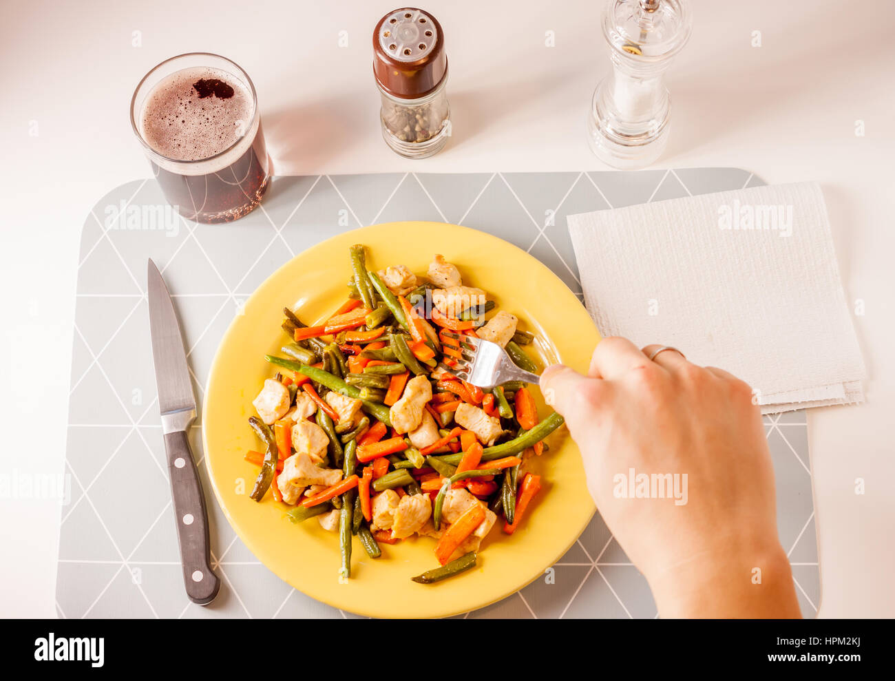 vegetables with meat on yellow plate Stock Photo Alamy