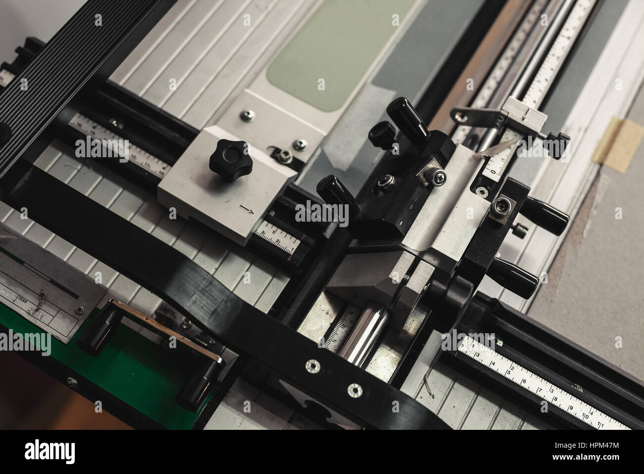 Closeup view of mat board cutting machine Stock Photo Alamy