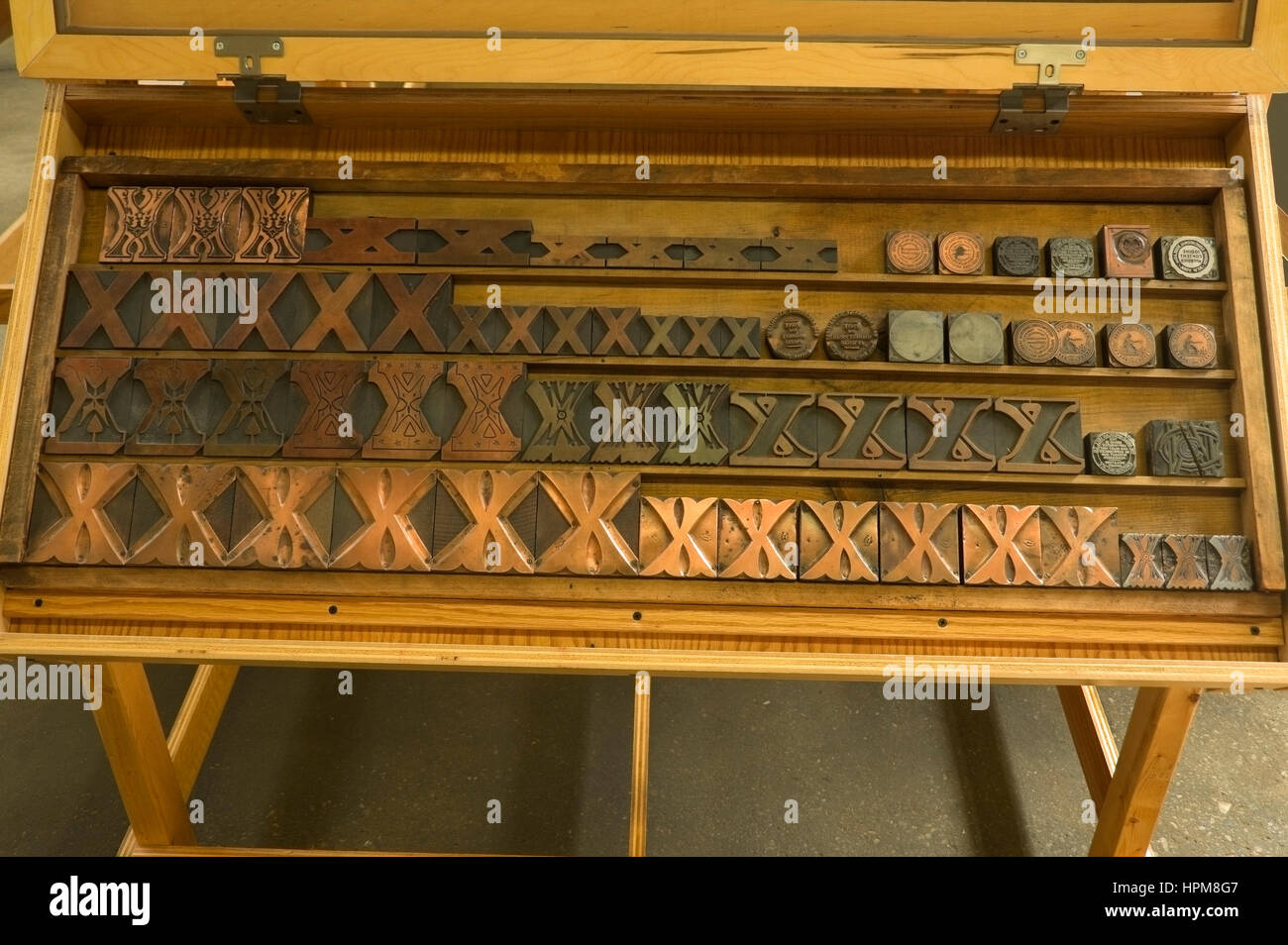 Antique metal and wood decorative printing blocks, on display at Hamilton Wood Type and Printing