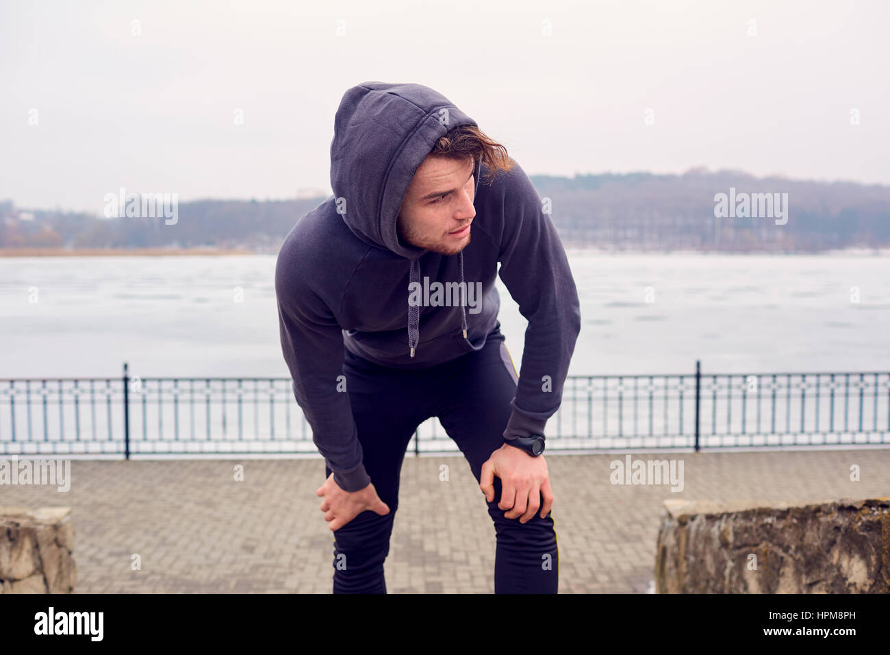 Young man in sportswear a park for sports Stock Photo