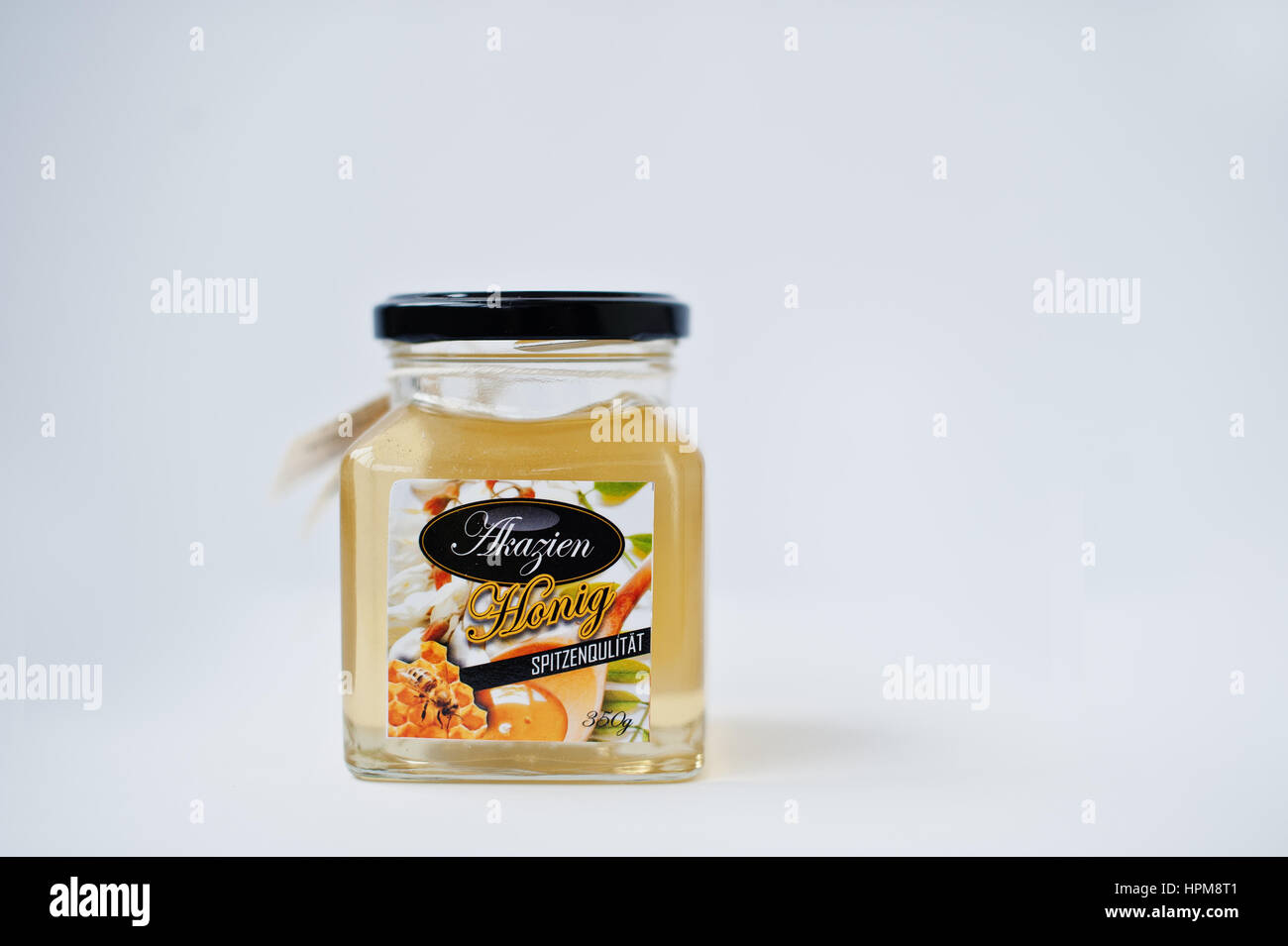 Athens, Greece - February 22, 2017: Jar of honey Akazien Honig. Stock Photo