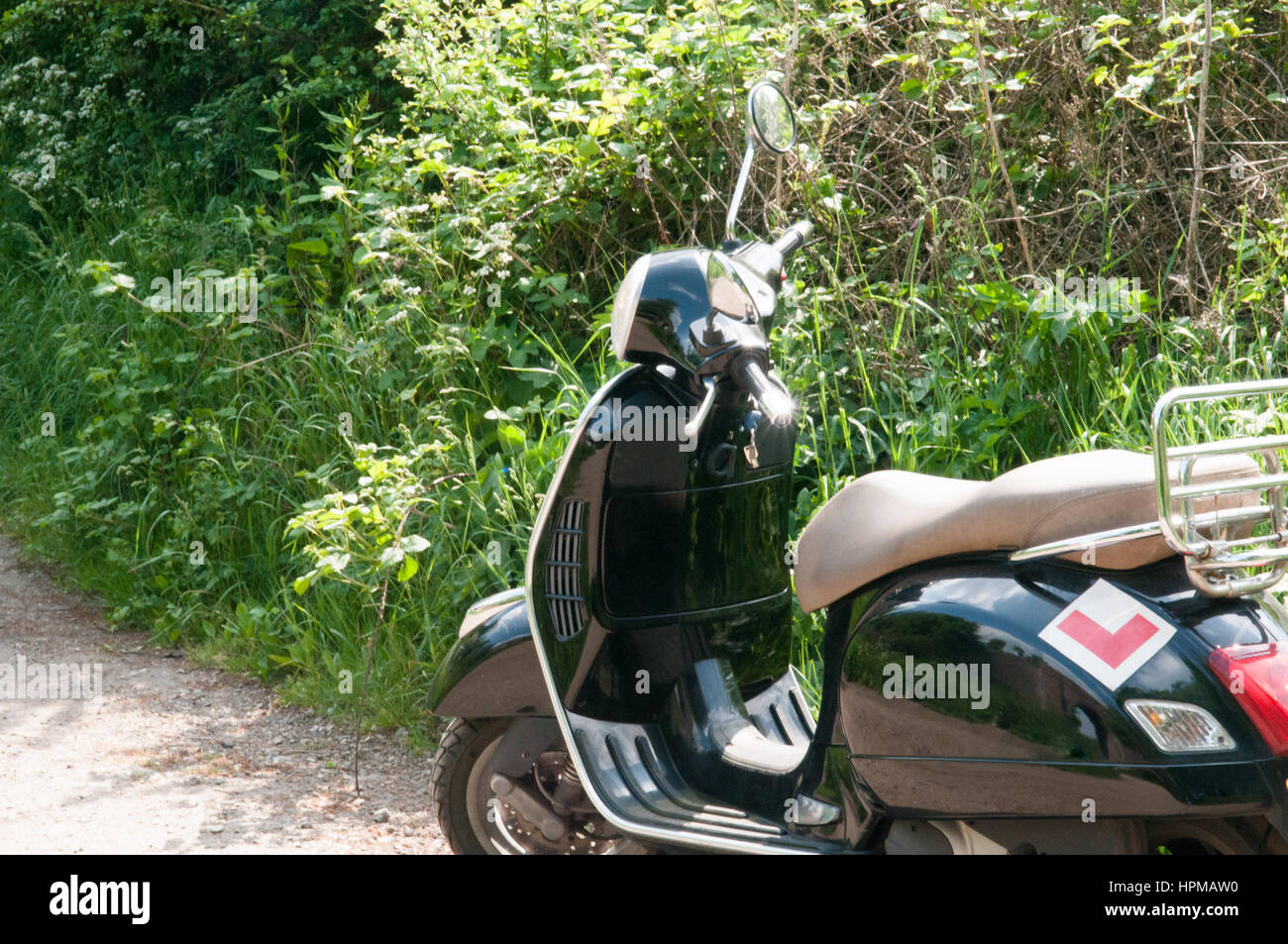 retro style motorcylce parked outside Stock Photo