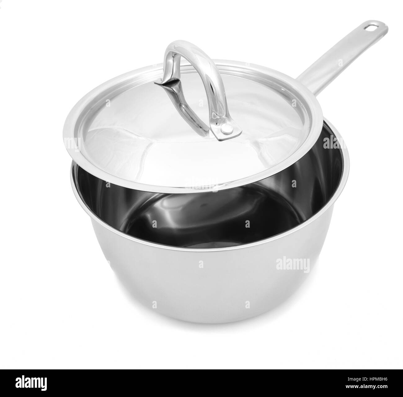Steel  pan with cover and handle White background. Stock Photo
