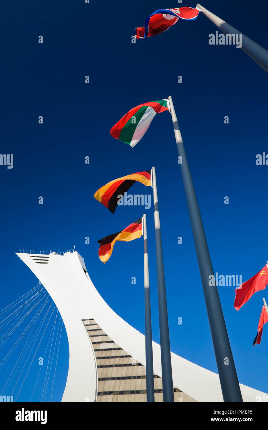 The Montreal Tower and flags at Olympic Stadium park, Montreal, Quebec, Canada. Stock Photo